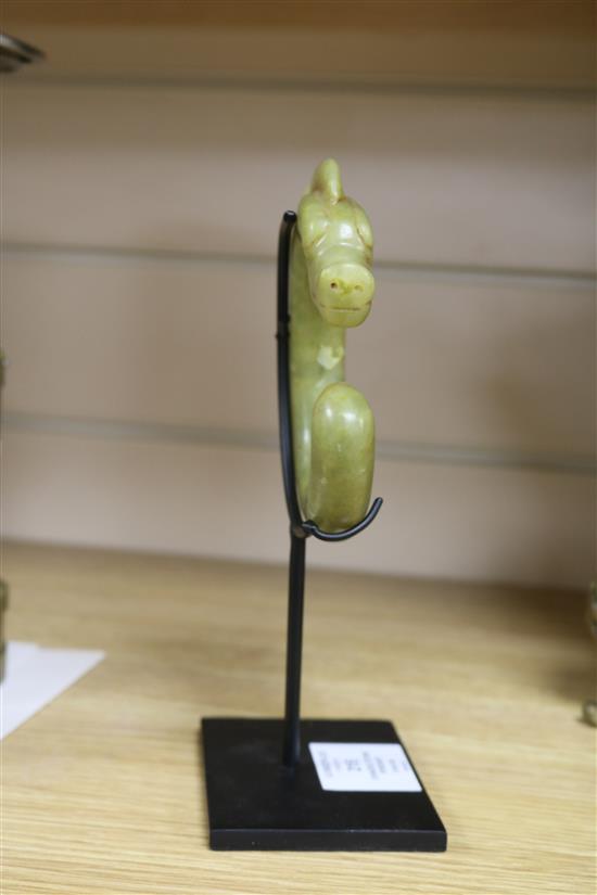 A Chinese yellow carved stone pendant